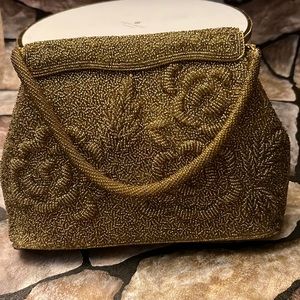 Gold beating vintage handbags with handle snap closure satin tan lining